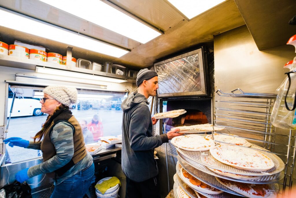 Korey Klein inside the Whistler Wood Fired Pizza food truck