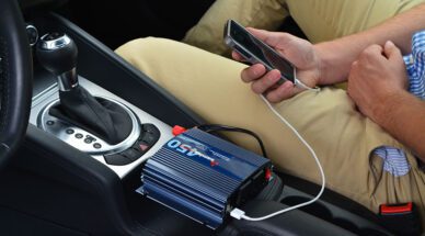 car power inverter with USB port charging phone