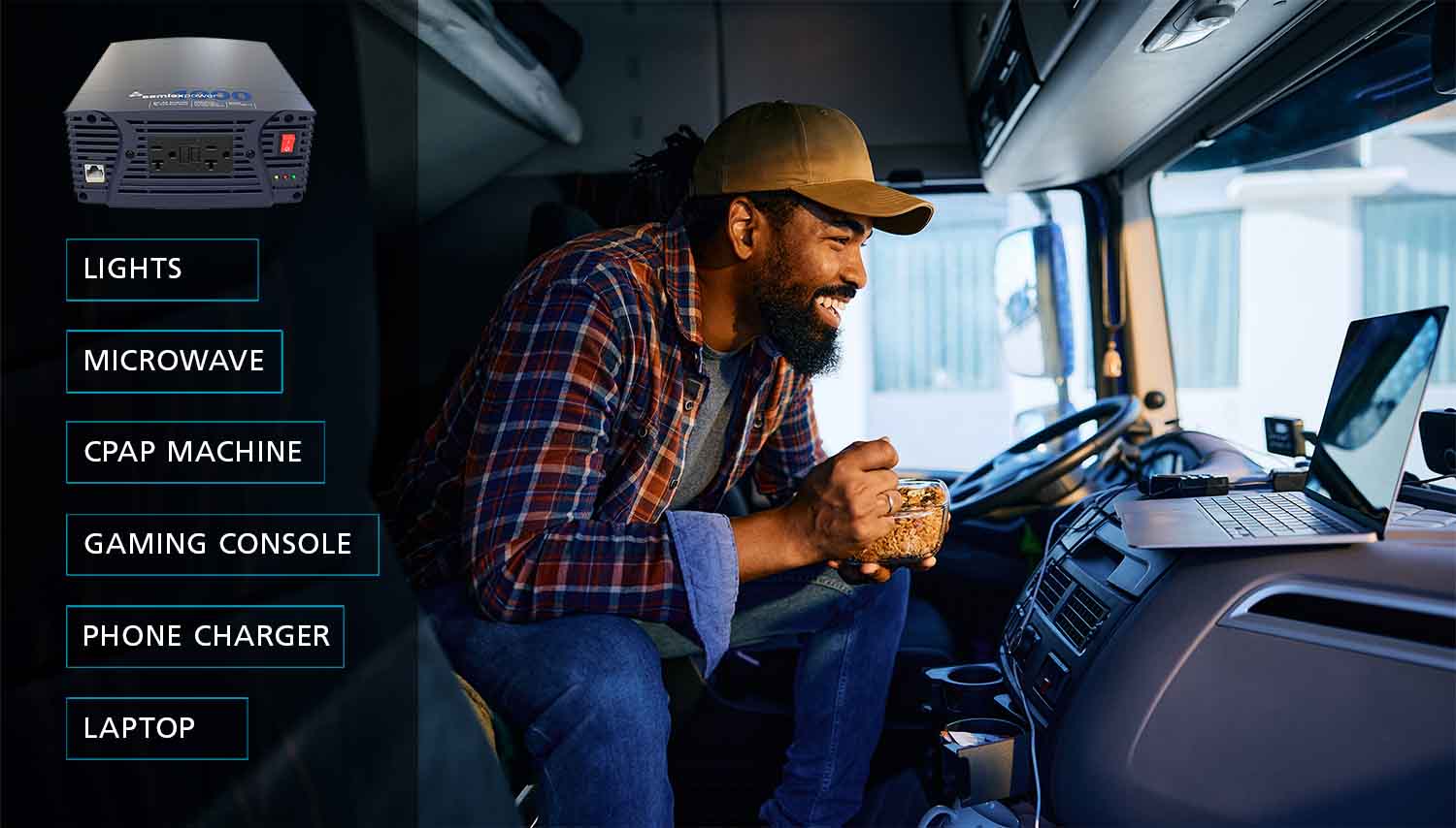 truck driver watching laptop and eating microwave meal in semi truck by using power inverter